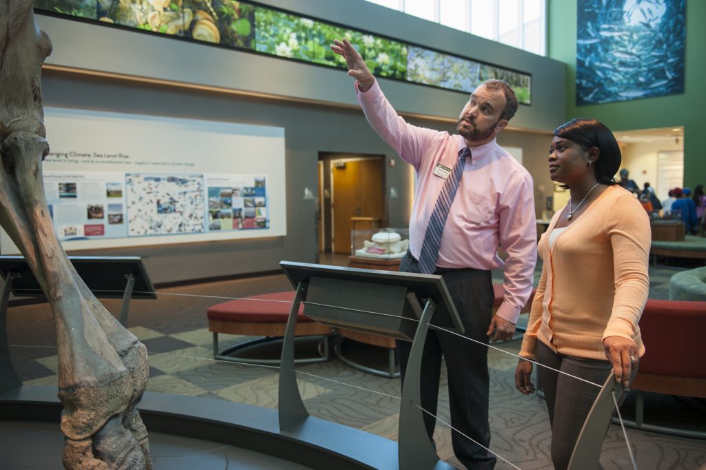 AMMC Research Supervisor Nameiko Miller touring museum with Assistant Director of Marketing & Public Relations, Paul Ramey